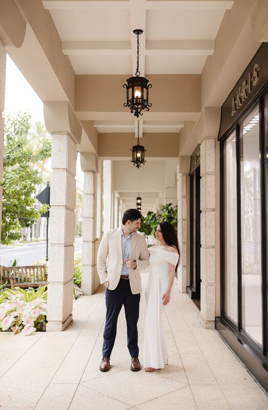 Iviani and Joey walking through the arcade
